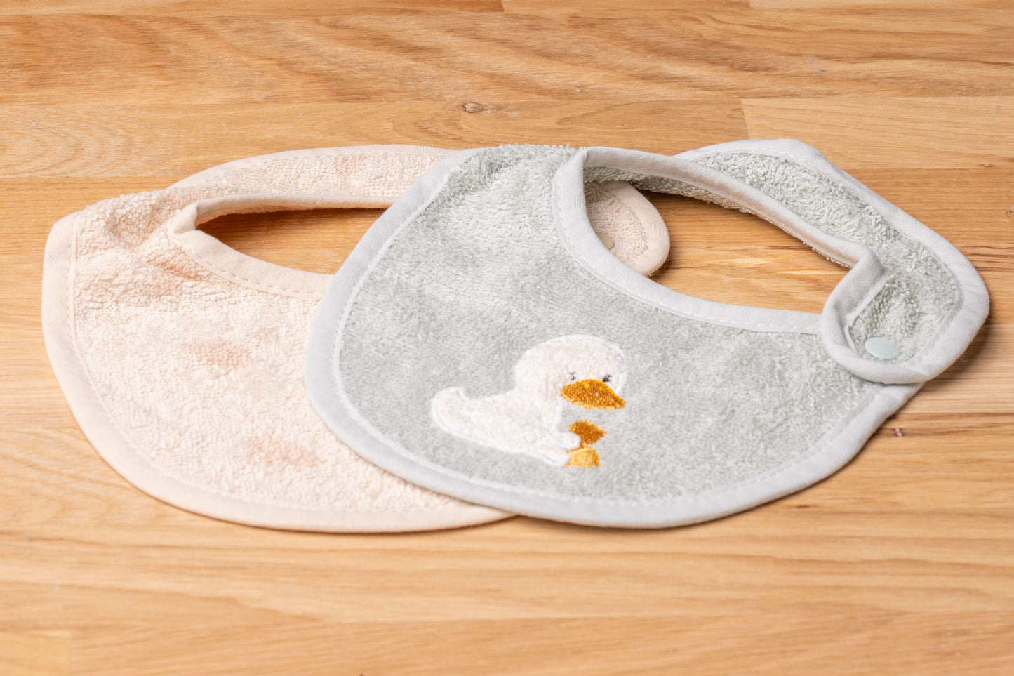 Baby Lätzchen mit Druckknopf 2er Set Ente schenkefreude.ch