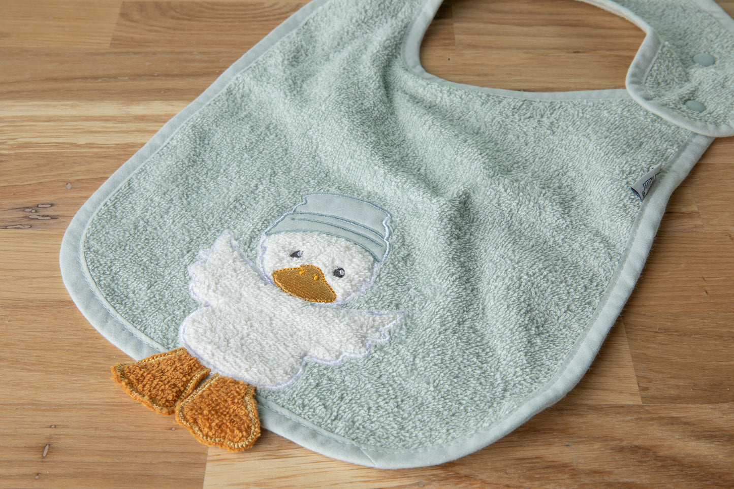 Baby Lätzchen mit Druckknopf Happy schenkefreude.ch